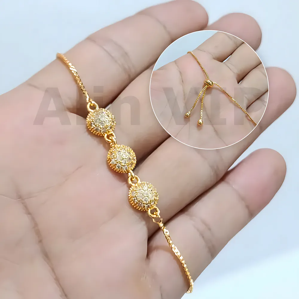 gelang serut aesthetic lapisan logam gold tiga bola zircon berkilau alin vip gls051