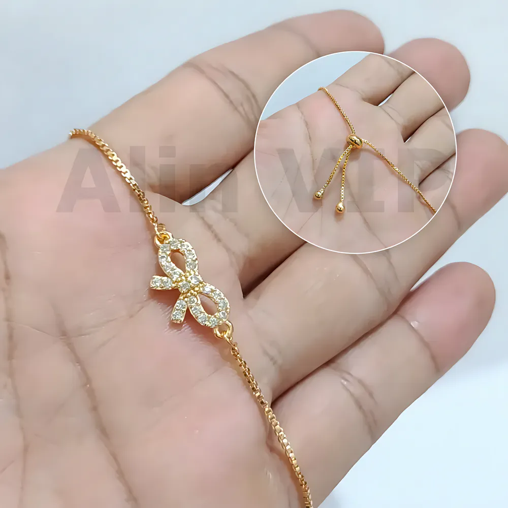 gelang serut wanita lapis emas motif pita permata zirconia alin vip gls004