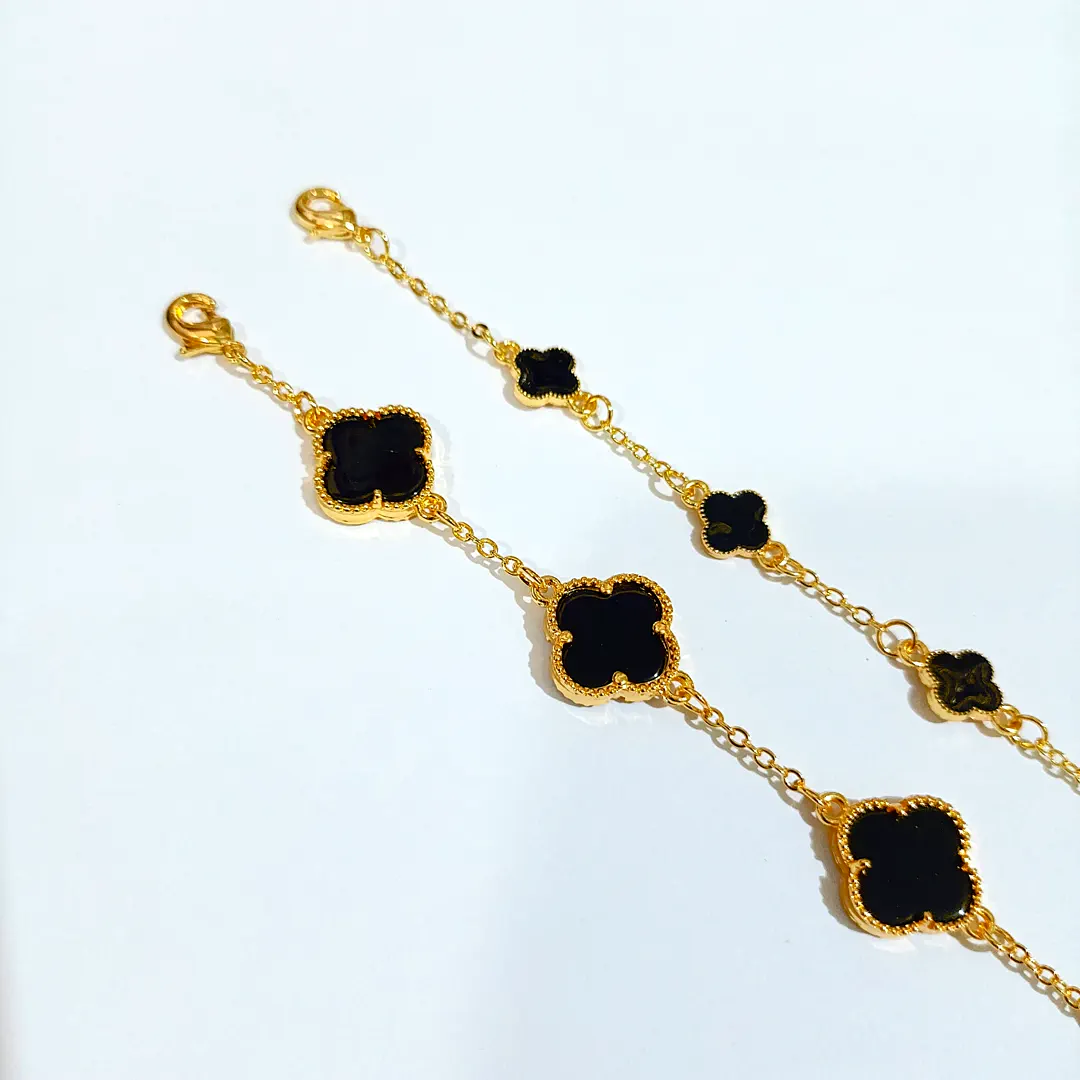gelang titanium rantai nori bunga clover hitam bingkai gerigi manik gold alin vip glw211